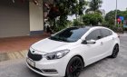 Kia K3 2015 - Xe Kia K3 đời 2015, màu trắng như mới giá cạnh tranh