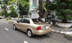 Ford Laser 2004 - Ford Laser 1.8 số tự động, vàng cát 2004