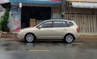 Kia Carens 2009 - Bán xe Kia Carens 2009, màu vàng cát