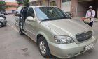 Kia Carnival  AT 2009 - Cần bán Kia Carnival AT năm sản xuất 2009, màu bạc, số tự động