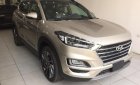 Hyundai Tucson 1.6 AT Turbo 2019 - Bán Hyundai Tucson 1.6 AT Turbo đời 2019, màu vàng, giá 910tr