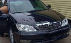 Toyota Camry 2.4G 2004 - Cần bán gấp Toyota Camry 2.4G 2004, màu đen