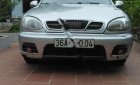 Daewoo Lanos SX 2004 - Bán ô tô Daewoo Lanos SX sản xuất năm 2004, màu bạc