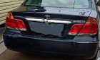 Toyota Camry 2.4G 2004 - Cần bán gấp Toyota Camry 2.4G 2004, màu đen