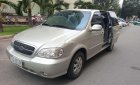 Kia Carnival  AT 2009 - Cần bán Kia Carnival AT năm sản xuất 2009, màu bạc, số tự động