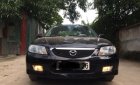 Mazda 323 Standard 2002 - Bán Mazda 323 Standard năm sản xuất 2002, màu đen 