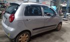 Chevrolet Spark 2011 - Cần bán gấp Chevrolet Spark sản xuất 2011, màu bạc