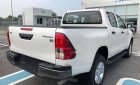 Toyota Hilux 2019 - Bán Toyota Hilux 2.4E 4x2 AT năm sản xuất 2019, màu trắng, xe nhập