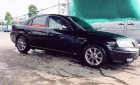 Ford Mondeo V6 2005 - Bán ô tô Ford Mondeo V6 năm 2005, màu đen số tự động, 240tr