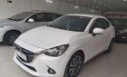 Mazda 2 2016 - Cần bán gấp Mazda 2 sản xuất 2016, màu trắng chính chủ, giá 465tr xe nguyên bản