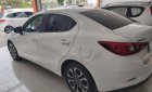 Mazda 2 2016 - Cần bán gấp Mazda 2 sản xuất 2016, màu trắng chính chủ, giá 465tr xe nguyên bản