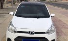 Hyundai Grand i10    MT 2014 - Cần bán Hyundai Grand i10 MT sản xuất 2014, màu trắng, nhập khẩu xe gia đình