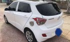 Hyundai Grand i10    MT 2014 - Cần bán Hyundai Grand i10 MT sản xuất 2014, màu trắng, nhập khẩu xe gia đình