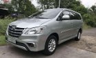 Toyota Innova 2014 - Bán Toyota Innova E đời 2014, màu bạc xe gia đình, giá tốt