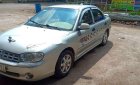 Kia Spectra 2004 - Cần bán gấp Kia Spectra 2004, màu bạc xe nguyên bản