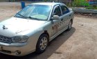 Kia Spectra 2004 - Cần bán gấp Kia Spectra 2004, màu bạc xe nguyên bản