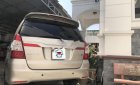 Toyota Innova 2015 - Bán Toyota Innova 2.0E MT đời 2015, màu vàng xe gia đình