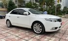 Kia Cerato 1.6AT 2011 - Cần bán lại xe Kia Cerato 1.6AT năm 2011, màu trắng, nhập khẩu