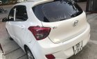 Hyundai Grand i10   2014 - Bán Hyundai Grand i10 đời 2014, màu trắng, xe nhập, số sàn