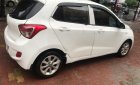 Hyundai Grand i10   2014 - Bán Hyundai Grand i10 đời 2014, màu trắng, xe nhập, số sàn