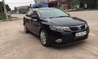 Kia Forte 2011 - Cần bán lại xe Kia Forte SX 1.6 MT 2011, màu đen, 330tr