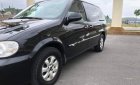 Kia Carnival 2.4 2009 - Bán Kia Carnival 2.4 sản xuất năm 2009, màu đen xe gia đình, 245tr