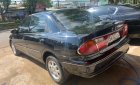 Mazda 323 1998 - Cần bán Mazda 323 đời 1998, màu đen, nhập khẩu chính hãng