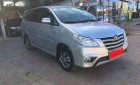 Toyota Innova 2.0E 2014 - Bán xe Toyota Innova 2.0E 2014, màu bạc như mới