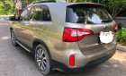 Kia Sorento 2015 - Cần bán xe Kia Sorento năm sản xuất 2015, màu vàng, 655tr xe còn mới nguyên