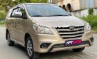 Toyota Innova 2016 - Cần bán lại xe Toyota Innova đời 2016, màu vàng, giá 565tr