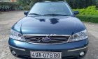 Ford Laser 2004 - Cần bán xe Ford Laser sản xuất 2004, màu xanh lam xe gia đình