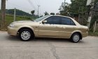 Ford Laser 2001 - Bán Ford Laser năm 2001, màu vàng, 125tr