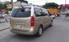 Hyundai Grand Starex 2.5 MT 2010 - Bán xe Hyundai Grand Starex 2.5MT năm 2010, màu vàng, nhập khẩu