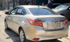 Toyota Vios 2017 - Bán Toyota Vios 2017, màu vàng cát số tự động xe còn mới lắm