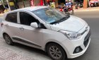 Hyundai Grand i10 2016 - Cần bán lại xe Hyundai Grand i10 1.2 MT năm sản xuất 2016, màu trắng, nhập khẩu xe gia đình, 310tr