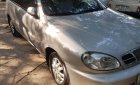 Daewoo Lanos SX 2004 - Cần bán xe Daewoo Lanos SX sản xuất 2004, màu bạc chính chủ giá cạnh tranh