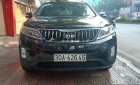 Kia Sorento GAT 2.4L 4WD 2014 - Cần bán gấp Kia Sorento GAT 2.4L 4WD năm sản xuất 2014, màu đen chính chủ, 570tr