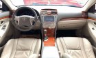 Toyota Camry 2.4G 2010 - Cần bán Toyota Camry 2.4G năm 2010, màu đen xe gia đình