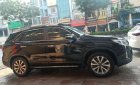 Kia Sorento GAT 2.4L 4WD 2014 - Cần bán gấp Kia Sorento GAT 2.4L 4WD năm sản xuất 2014, màu đen chính chủ, 570tr