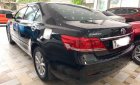 Toyota Camry 2.4G 2010 - Cần bán Toyota Camry 2.4G năm 2010, màu đen xe gia đình