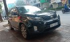 Kia Sorento GAT 2.4L 4WD 2014 - Cần bán gấp Kia Sorento GAT 2.4L 4WD năm sản xuất 2014, màu đen chính chủ, 570tr