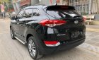 Hyundai Tucson 2017 - Cần bán lại xe Hyundai Tucson 2.0 ATH 2017, màu đen xe còn mới lắm