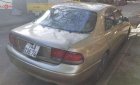Mazda 626 1994 - Cần bán Mazda 626 sản xuất 1994, màu vàng, nhập khẩu nguyên chiếc giá cạnh tranh