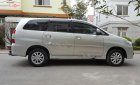 Toyota Innova 2.0E 2014 - Bán Toyota Innova MT sản xuất 2014, màu bạc số sàn