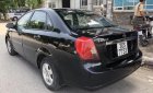 Daewoo Lacetti 2009 - Cần bán gấp Daewoo Lacetti sản xuất 2009, màu đen