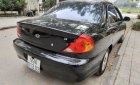 Kia Spectra   2005 - Bán Kia Spectra đời 2005, màu đen chính chủ, giá 107tr