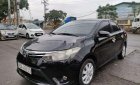 Toyota Vios 2014 - Cần bán gấp Toyota Vios sản xuất 2014, màu đen số sàn