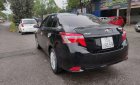 Toyota Vios 2014 - Cần bán gấp Toyota Vios sản xuất 2014, màu đen số sàn