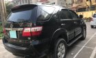 Toyota Fortuner 2011 - Bán ô tô Toyota Fortuner G MT sản xuất năm 2011, màu đen số sàn, 595 triệu