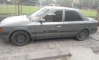 Mazda 323 1994 - Cần bán lại xe Mazda 323 năm sản xuất 1994, màu bạc, nhập khẩu nguyên chiếc, giá tốt